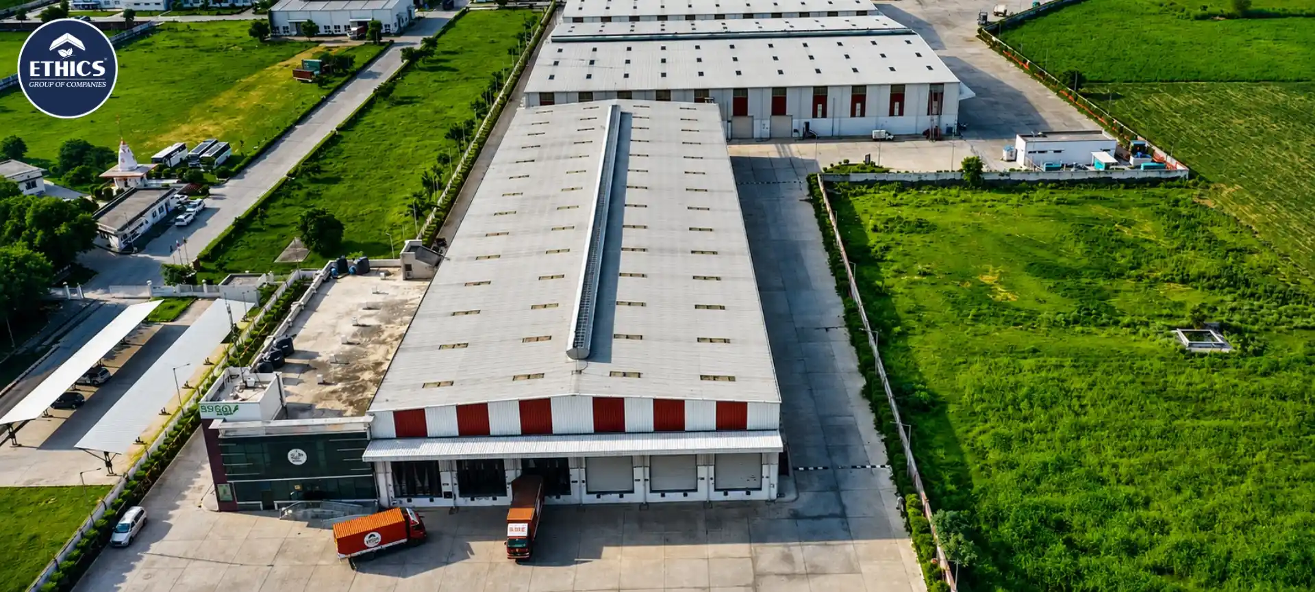 Modern sustainable warehouse in India with solar panels, energy-efficient infrastructure, and green logistics operations